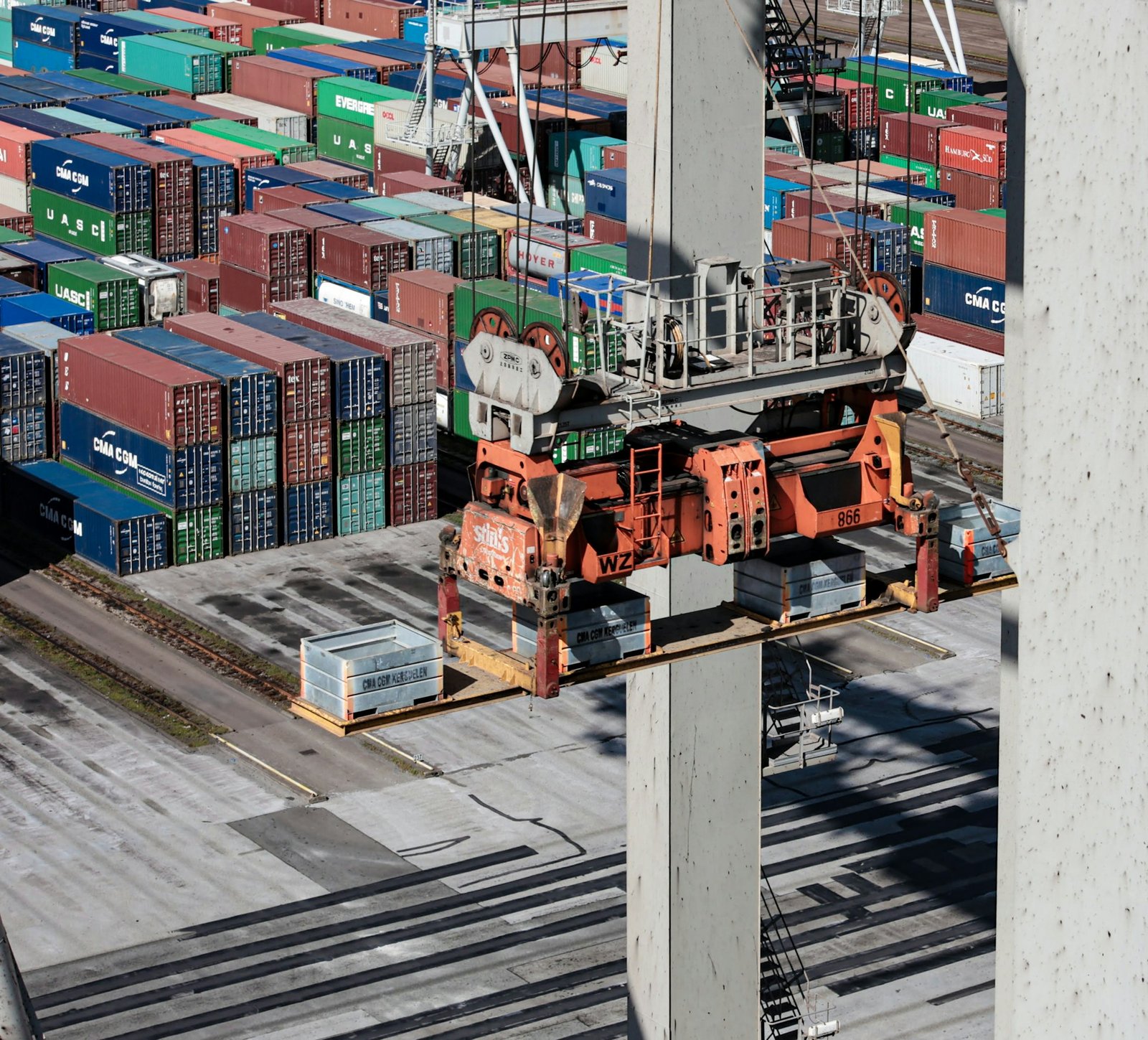 Overhead view of a working container terminal and cargo crane